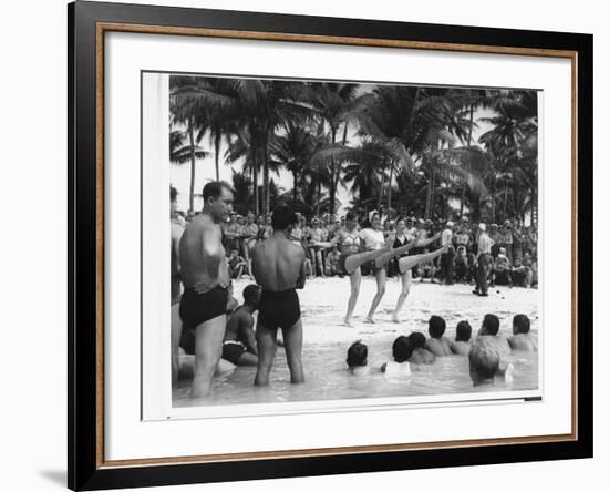 USO Chorus Girls Doing High-Kicks in Swimsuits During Impromptu Song and Dance on Beach-Peter Stackpole-Framed Premium Photographic Print