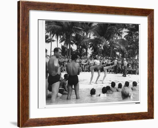 USO Chorus Girls Doing High-Kicks in Swimsuits During Impromptu Song and Dance on Beach-Peter Stackpole-Framed Premium Photographic Print