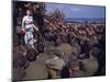 Uso Performer Entertaining a Crowd of Soldiers Aboard a Troop Transport Ship-Carl Mydans-Mounted Photographic Print