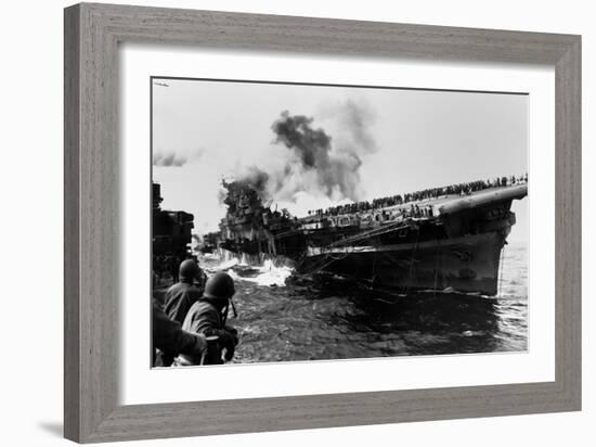 USS Franklin Aircraft Carrier on Fire and Listing after a Strike by a Japanese Dive Bomber-null-Framed Photo