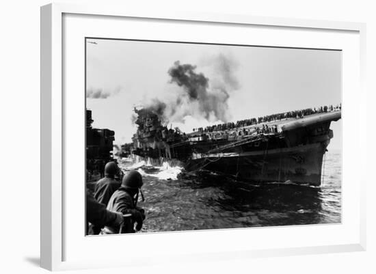 USS Franklin Aircraft Carrier on Fire and Listing after a Strike by a Japanese Dive Bomber-null-Framed Photo