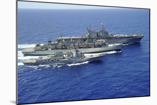 Uss Peleliu and USS Spruance Conduct a Replenishment at Sea with Usns Rainier-null-Mounted Photographic Print