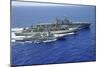 Uss Peleliu and USS Spruance Conduct a Replenishment at Sea with Usns Rainier-null-Mounted Photographic Print