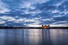 View to the illuminated castle Moritzburg, Saxony, in the early evening hours, blue hour with unusu-UtArt-Photographic Print