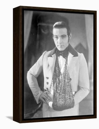 Valentino on the set of 'The Eagle' with his arm in a sling after a car accident, c.1925-null-Framed Premier Image Canvas