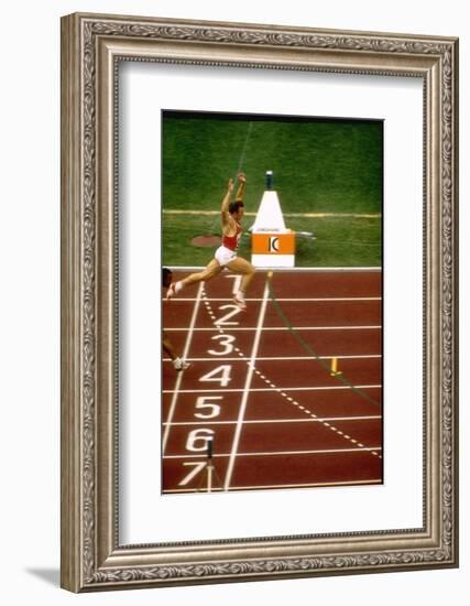 Valeri Borsov of the Soviet Union Winning the 100 Meter Finals During the Summer Olympics-John Dominis-Framed Photographic Print