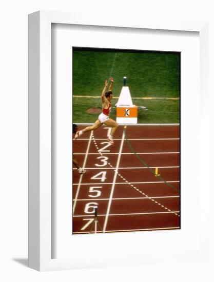 Valeri Borsov of the Soviet Union Winning the 100 Meter Finals During the Summer Olympics-John Dominis-Framed Photographic Print