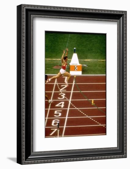 Valeri Borsov of the Soviet Union Winning the 100 Meter Finals During the Summer Olympics-John Dominis-Framed Photographic Print