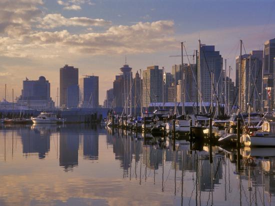 Vancouver Skyline With Boats In Harbor At Sunrise Seen From