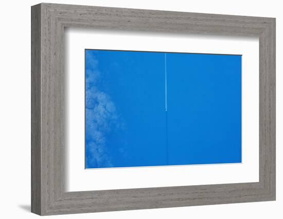 Vapor trail in sky over United Kingdom-null-Framed Photographic Print