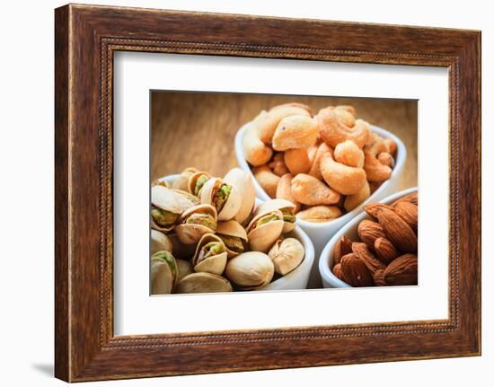 Varieties of Nuts: Cashew, Pistachio, Almond.-Voy-Framed Photographic Print