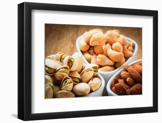 Varieties of Nuts: Cashew, Pistachio, Almond.-Voy-Framed Photographic Print