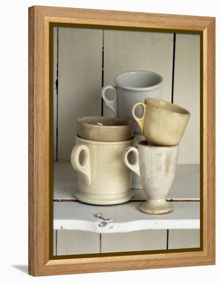 Various Light Coloured Cups on Wooden Shelf-Ellen Silverman-Framed Premier Image Canvas