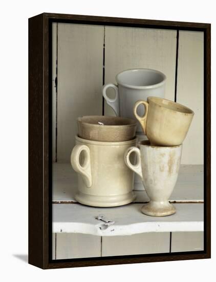 Various Light Coloured Cups on Wooden Shelf-Ellen Silverman-Framed Premier Image Canvas