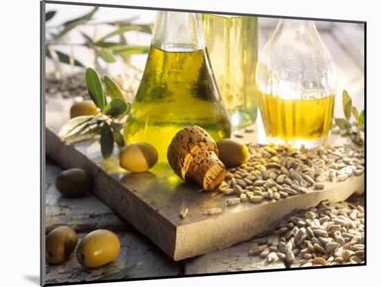Various Oils in Carafes, Olives, Sunflower Seeds-Peter Rees-Mounted Photographic Print