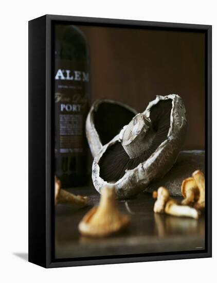 Various Types of Mushrooms in Front of Port Wine Bottle-Henrik Freek-Framed Premier Image Canvas