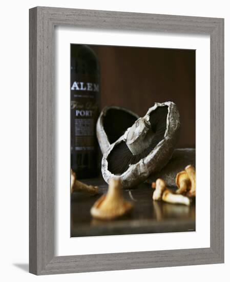 Various Types of Mushrooms in Front of Port Wine Bottle-Henrik Freek-Framed Photographic Print