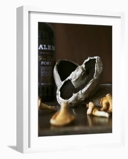 Various Types of Mushrooms in Front of Port Wine Bottle-Henrik Freek-Framed Photographic Print