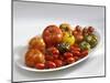 Various Types of Tomatoes on a Platter-Karl Newedel-Mounted Photographic Print