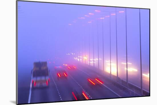 Vehicles Driving Through Fog on a Motorway-Jeremy Walker-Mounted Photographic Print