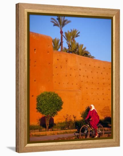 Veiled Woman Bicycling Below Red City Walls, Marrakech, Morocco-Merrill Images-Framed Premier Image Canvas