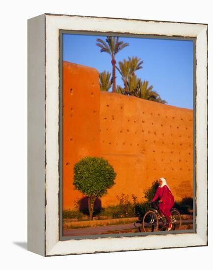 Veiled Woman Bicycling Below Red City Walls, Marrakech, Morocco-Merrill Images-Framed Premier Image Canvas