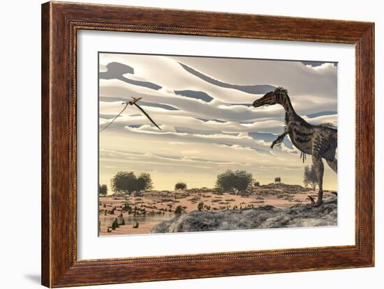 Velociraptor Dinosaur Observing a Pteranodon Flying over the Desert-Stocktrek Images-Framed Art Print