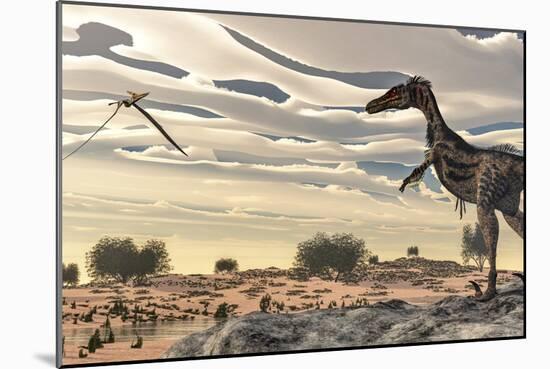 Velociraptor Dinosaur Observing a Pteranodon Flying over the Desert-Stocktrek Images-Mounted Art Print