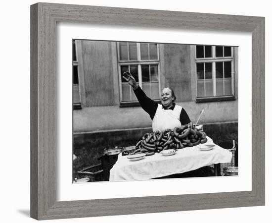 Vendor Trying to Sell Bundles of Sausage-Margaret Bourke-White-Framed Photographic Print