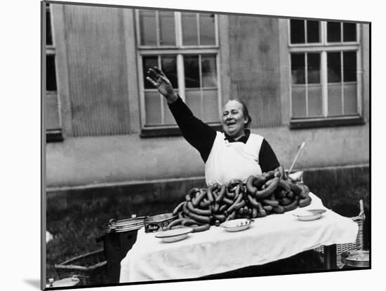 Vendor Trying to Sell Bundles of Sausage-Margaret Bourke-White-Mounted Photographic Print