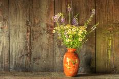 Retro Style Still Life of Dried Flowers in Vase against Worn Wooden Background-Veneratio-Photographic Print