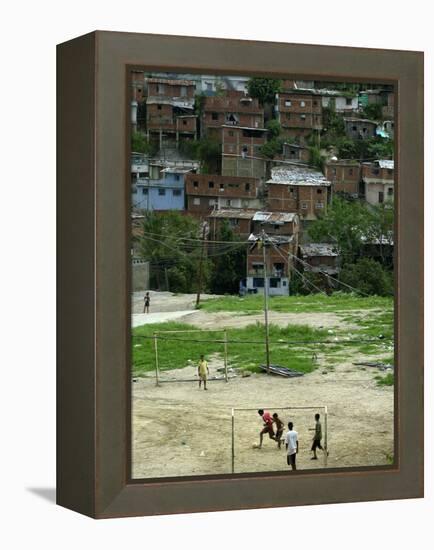 Venezuelan Children Play Soccer at the Resplandor Shantytown-null-Framed Premier Image Canvas