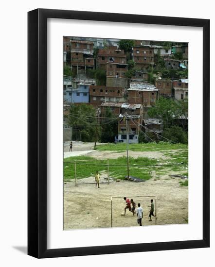 Venezuelan Children Play Soccer at the Resplandor Shantytown-null-Framed Photographic Print