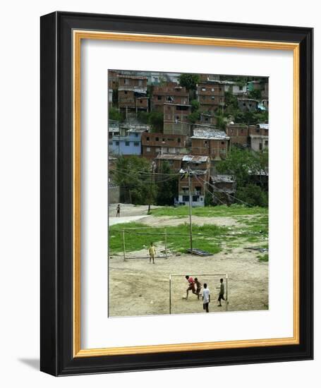 Venezuelan Children Play Soccer at the Resplandor Shantytown-null-Framed Photographic Print