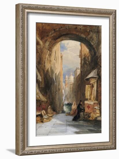 Venice: an Edicola Beneath an Archway, with Santa Maria Della Salute in the Distance, 1853-James Holland-Framed Giclee Print