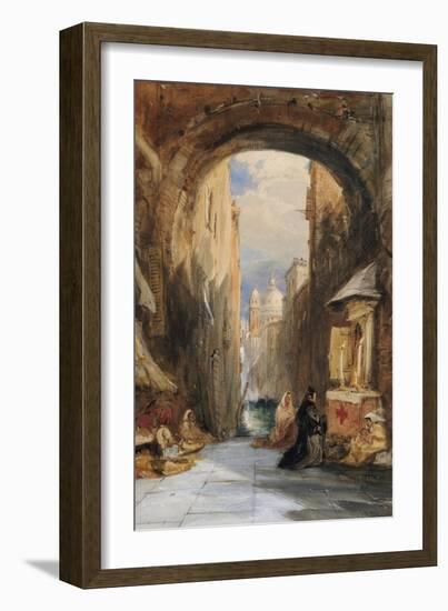 Venice: an Edicola Beneath an Archway, with Santa Maria Della Salute in the Distance, 1853-James Holland-Framed Giclee Print
