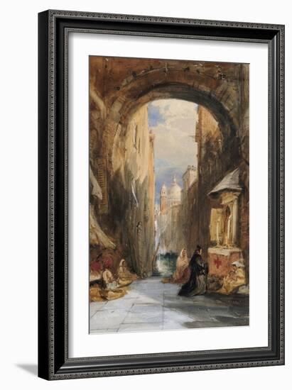 Venice: an Edicola Beneath an Archway, with Santa Maria Della Salute in the Distance, 1853-James Holland-Framed Giclee Print