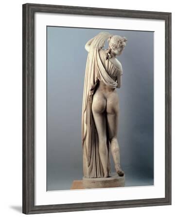 AN ITALIAN MARBLE FIGURE OF THE CALLIPYGIAN VENUS