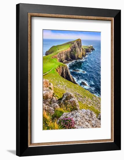 Vertical View of Neist Point Lighthouse and Rocky Ocean Coastline, Scotland-MartinM303-Framed Photographic Print