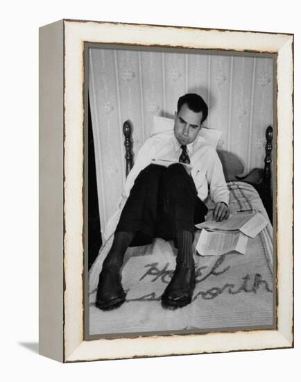 Vice Presidential Candidate Richard M. Nixon Sitting on His Hotel Bed Reviewing Paperwork-Cornell Capa-Framed Premier Image Canvas