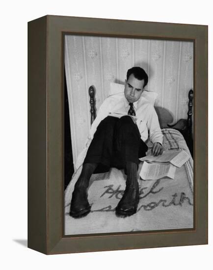 Vice Presidential Candidate Richard M. Nixon Sitting on His Hotel Bed Reviewing Paperwork-Cornell Capa-Framed Premier Image Canvas
