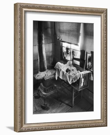 Victoria Cooper's Children Peering in Window Where Newborn Baby Lies in Crib Made from Fruit Crate-W^ Eugene Smith-Framed Photographic Print