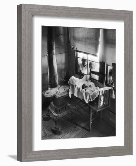 Victoria Cooper's Children Peering in Window Where Newborn Baby Lies in Crib Made from Fruit Crate-W^ Eugene Smith-Framed Photographic Print