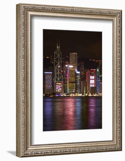 Victoria Harbor and light show on skyscrapers, Central, Hong Kong, China-David Wall-Framed Photographic Print