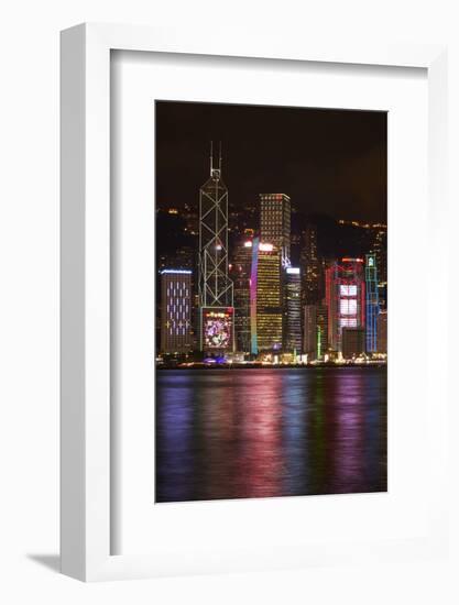 Victoria Harbor and light show on skyscrapers, Central, Hong Kong, China-David Wall-Framed Photographic Print