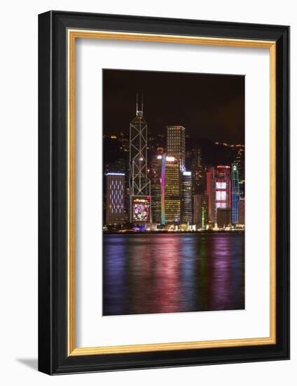 Victoria Harbor and light show on skyscrapers, Central, Hong Kong, China-David Wall-Framed Photographic Print