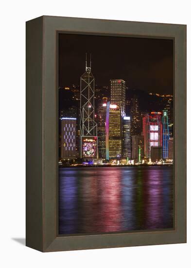 Victoria Harbor and light show on skyscrapers, Central, Hong Kong, China-David Wall-Framed Premier Image Canvas