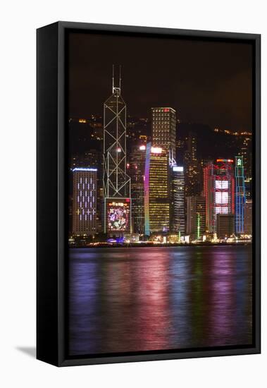 Victoria Harbor and light show on skyscrapers, Central, Hong Kong, China-David Wall-Framed Premier Image Canvas