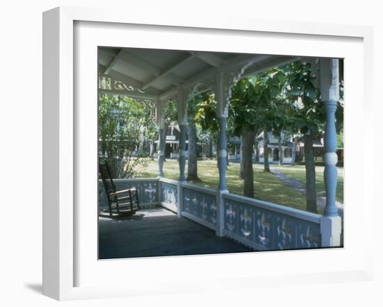 Victorian Front Porch W. Rocker and Other Gingerbread Houses in Background-Alfred Eisenstaedt-Framed Photographic Print