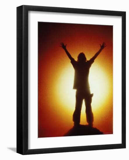 Victorious Climber Silhouetted by the Sun-null-Framed Photographic Print